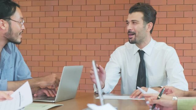 Group of interacial business people meeting in the offfice of company.