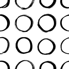 Seamless pattern with hand drawn black and white circles. Paint objects background for your design. Vector art drawing. Brush  grunge illustration