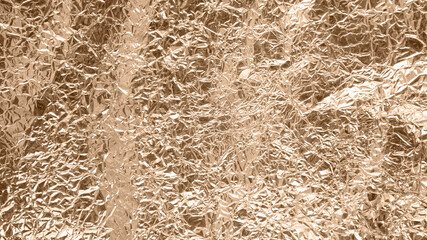 Crumpled gold foil texture background, aluminum wall , metal