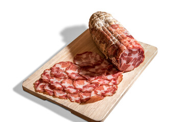 coppa piacentina of Pork meat, italian rolled bacon Pancetta. salami cut with slices on wooden cutting board isolated on white