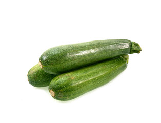 fresh green zucchini isolated on white background