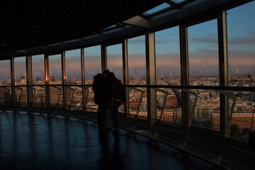 silhouette of people at observatory