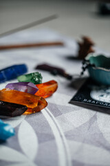 View of mixture of various colors glass triangular prism on on a yoga mat