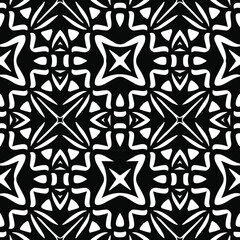 Geometric vector pattern with triangular elements. Seamless abstract ornament for wallpapers and backgrounds. Black and white patterns..
