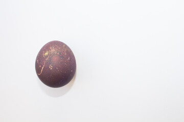 Minimal easter concept of brown egg. Stylish Easter brown on white marble background. The flat lay fashionable easter. Happy easter card with copy space for text