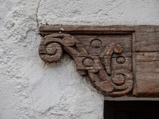 old wooden door frame with sculptured detail