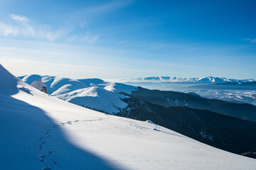 snow covered mountains in Romanian Carpathian mountains during winter