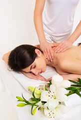 Obraz na płótnie Canvas Neck massage of a beautiful woman. Massage and spa care