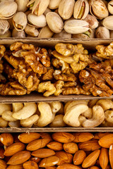 Assorted nuts set in eco cardboard packaging.