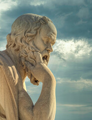 Socrates the ancient Greek philosopher and thinker under impressive sky, Athens Greece