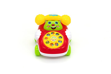 Plastic toy phone isolated on white.