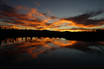 Mountain Sunset with Lake Reflection 