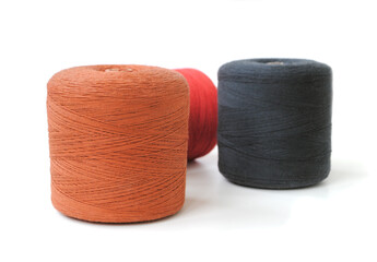 Old sewing thread isolated on white background ..