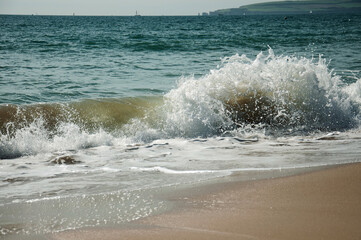 Waves on the beach in summer