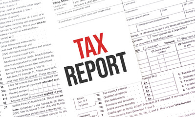 Yellow Paper Note With Words TAX REPORT , Tax concept