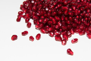 Garnet seeds on white background