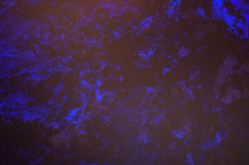 Cigarette ash after burning a cigarette in blue color close-up, macro photography