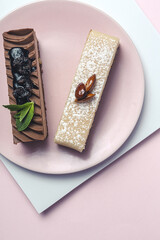 Traditional French luxurious cakes with mint leaves