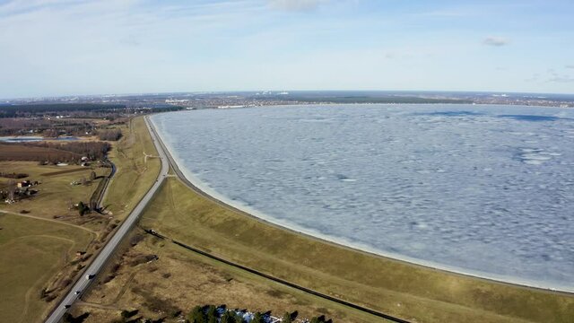 Aerial winter view of the huge dam in Latvia near city of Salaspils and Riga.