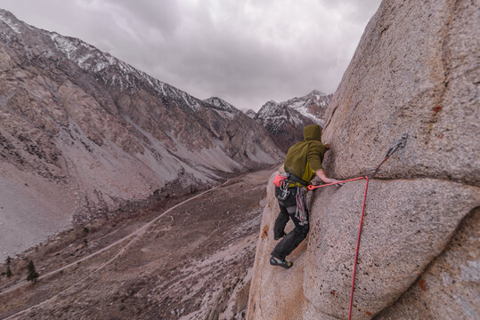 Climber trad climbing, Pine Creek, Bishop, California, USA