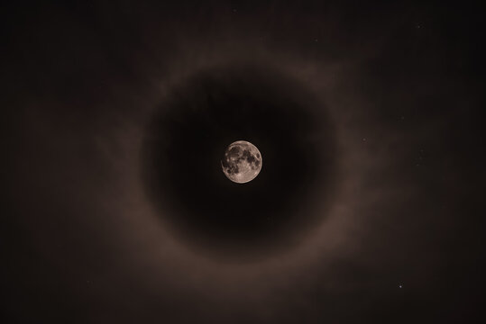 22 degree halo around moon, Bishop, California, USA
