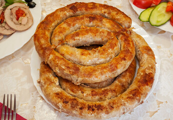 Homemade sausages on the festive table