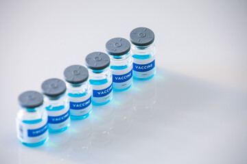 Covid vaccine bottles. Coronavirus medical background