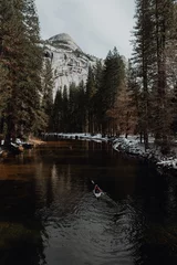 Fotobehang Man kayaking in lake, Yosemite Village, California, United States © Image Source