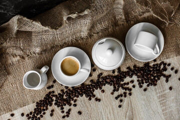 white cup, coffee beans, espresso, dark background