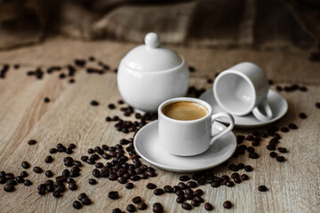white cup, coffee beans, espresso, dark background