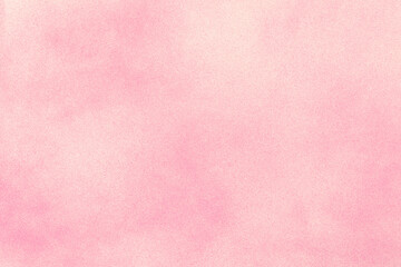 pink spray paint on white paper background 