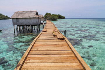 Obraz premium new wooden street on the water like a pier in construction