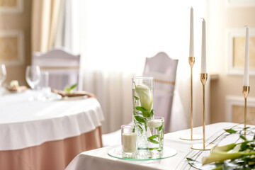 Beautiful decoration of the wedding holiday with flowers and greenery with florist decoration