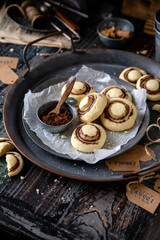 champignon shaped shortbread cookies on metal vintage tray