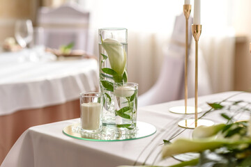 Beautiful decoration of the wedding holiday with flowers and greenery with florist decoration