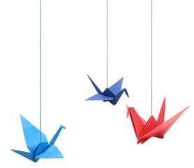 Hanging colorful origami paper birds on white