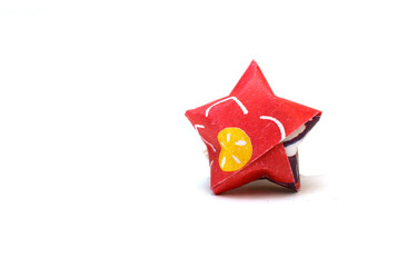 A lucky paper star on white