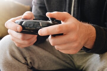 closeup of a man playing computer games