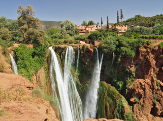 Ouzoud Waterfall in Morocco is an enclave of green and cooling water, popular spot for natives and...
