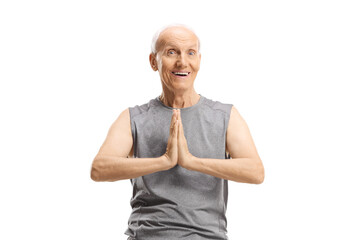 Elderly man practicing yoga