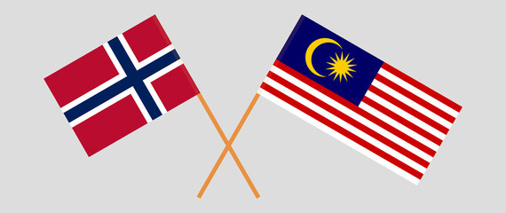 Crossed flags of Norway and Malaysia. Official colors. Correct proportion