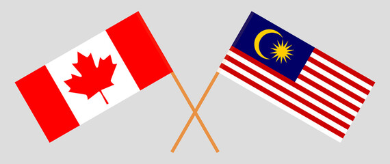Crossed flags of Canada and Malaysia. Official colors. Correct proportion