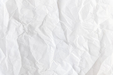 abstract background of crumpled white parchment texture close up