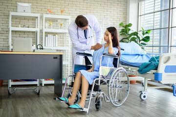 Fototapeta premium Working women have a headache on a wheelchair inside the clinic.