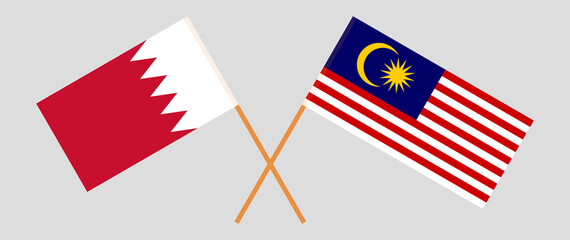 Crossed flags of Bahrain and Malaysia. Official colors. Correct proportion