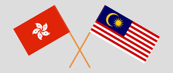 Crossed flags of Hong Kong and Malaysia. Official colors. Correct proportion