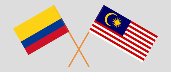 Crossed flags of Colombia and Malaysia. Official colors. Correct proportion