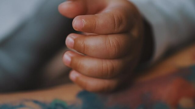 Close up hand of african american black baby. High quality 4k footage