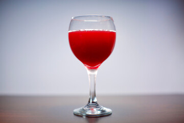 glass of red wine and blurry background