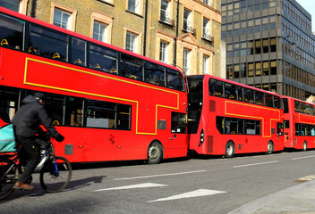 city red bus in line in london ,Russel square region .february 2021
